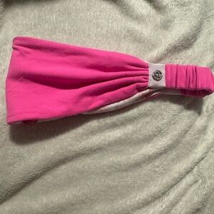 Lululemon hot pink and flowers reversible headband.